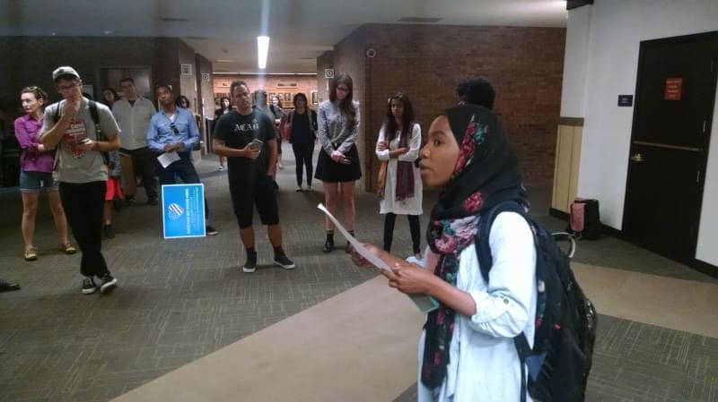 Shameen Razack, president of the Parkland College Social Justice Club, leads a protest of police treatment of minorities.