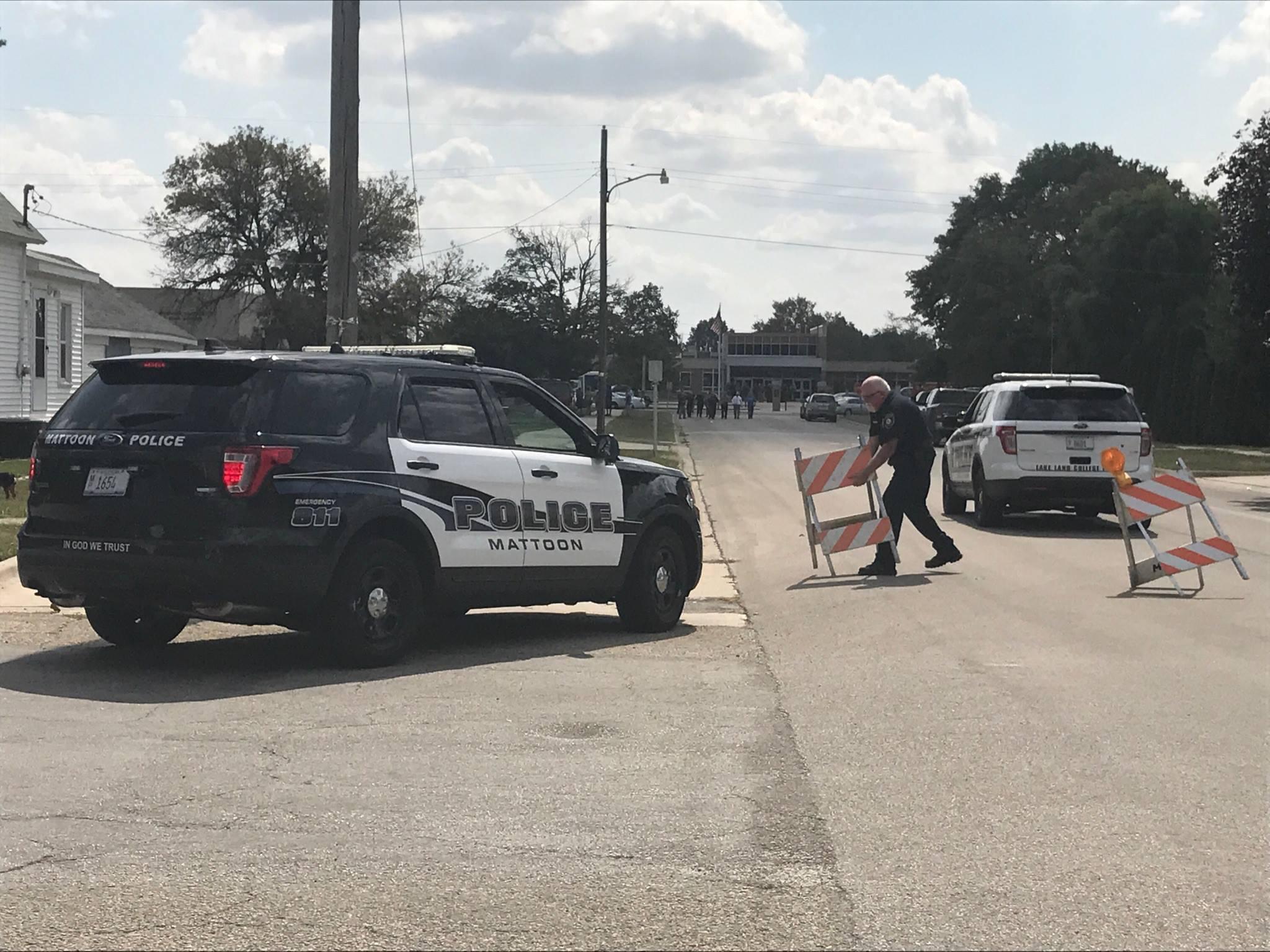 Mattoon Police putting up barricades in front of Mattoon High School on Wednesday afternoon.