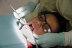 child with dentist