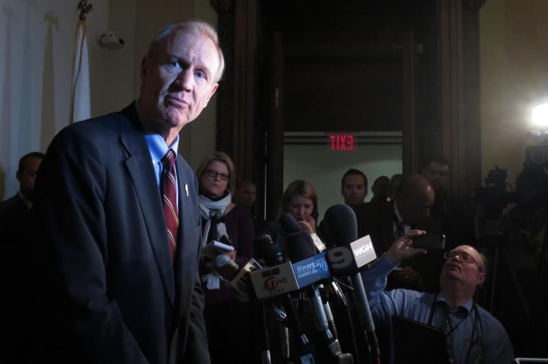 In this file photo, Gov. Bruce Rauner talks with reporters in Springfield.