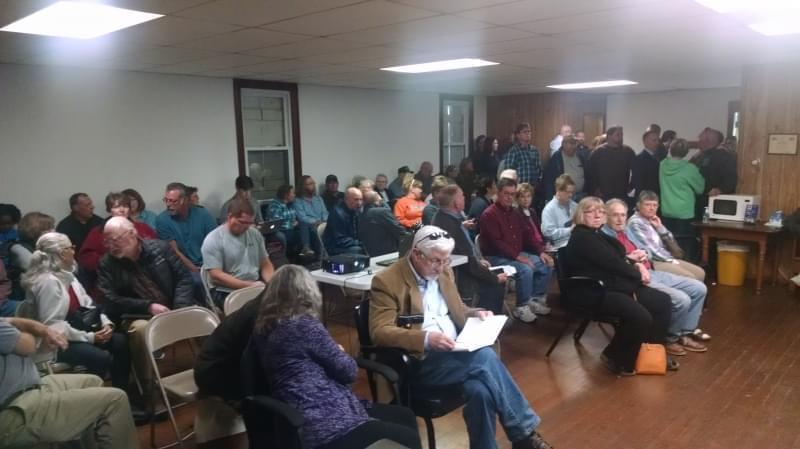 Over 100 people attended an informational meeting Monday night in Newcomb Township about a natural gas leak that contaminated five private water wells.