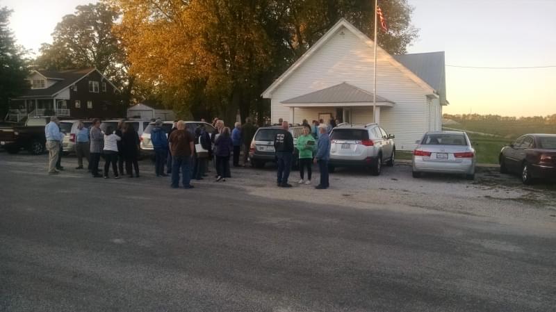 Residents father outside the Newcomb Township Hall on October 16, to hear the latest information from Spiros Law about the natural gas leak between Mahomet and Fisher.