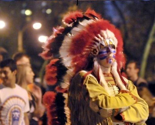 A student portraying the retired Chief Illiniwek.