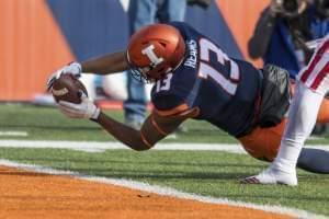 Illinois tight end Caleb Reams (13) dives in the end zone for a touchdown during the fourth quarter of an NCAA college football game against Illinois, Saturday, Nov. 11, 2017 at Memorial Stadium in Champaign, Ill. Indiana defeated Illinois 24-14.