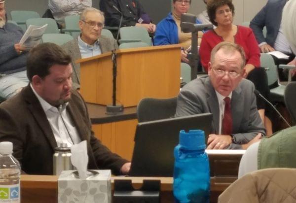 Champaign Unit Four School Board President Chris Kloeppel and attorney Patrick Fitzgerald, testifying before the Champaign Plan Commission.