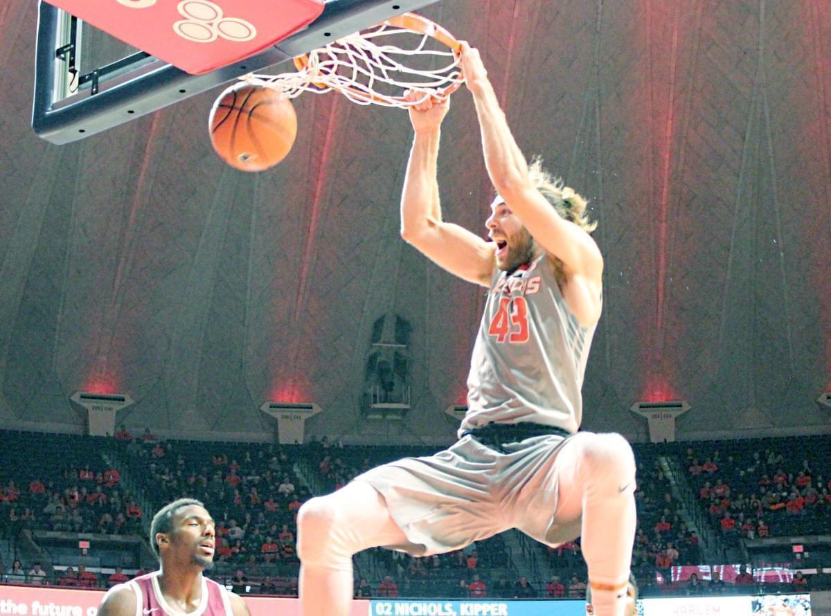 Illini forward Michael Finke slams home two of his 22 points in an 86-73 win over NC Central Friday night in Champaign.