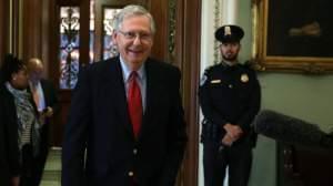Senate Majority Leader Mitch McConnell said Friday that Republicans had the votes to pass a sweeping overhaul of the country's tax code. The measure passed early Saturday morning. 
