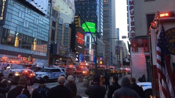 After an explosion a block away, police swarmed through Times Square in Manhattan. 