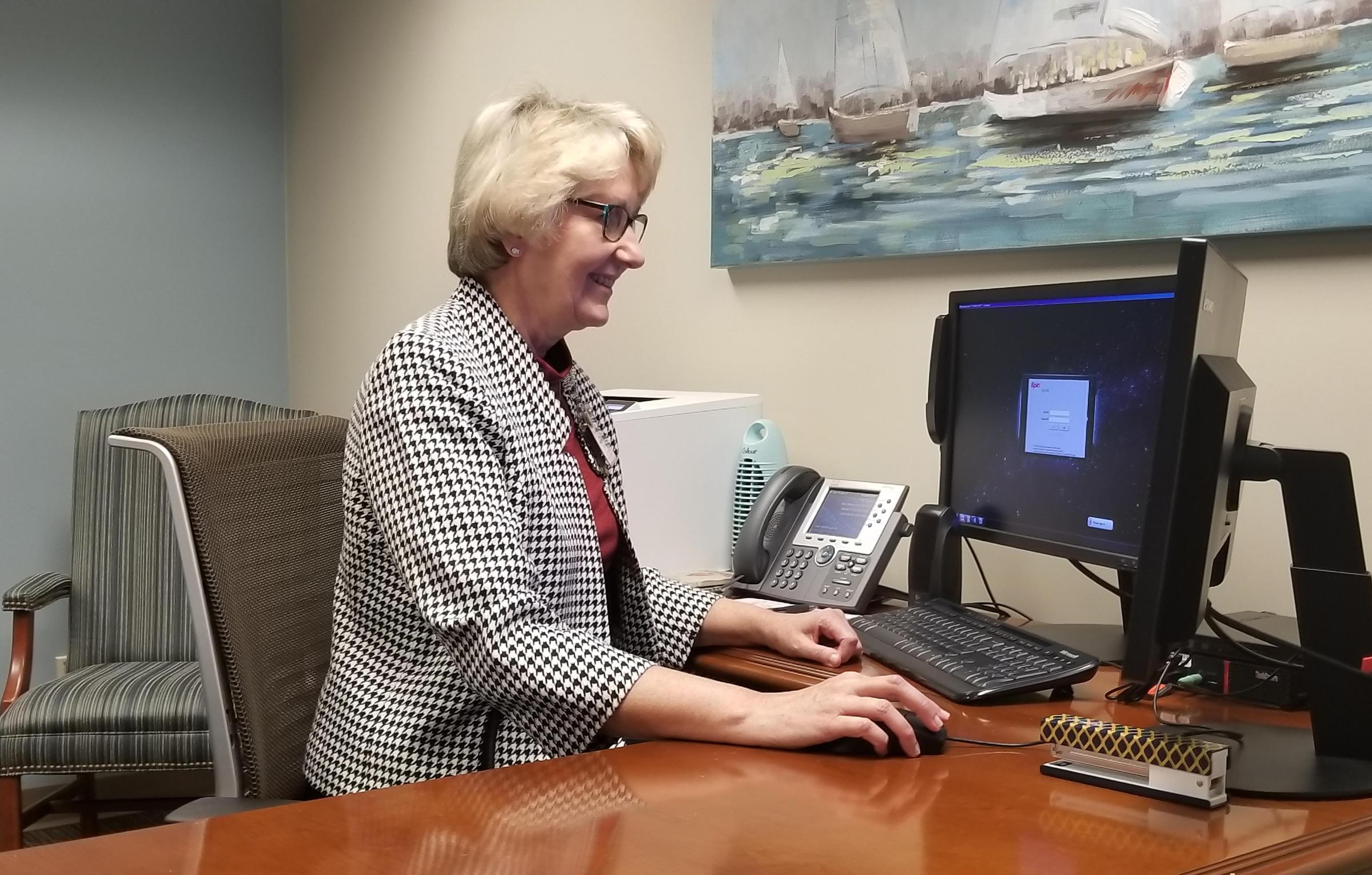 Dr. Gina Huhnke in her office at Midtown Deaconess Hospital in Evansville, Indiana.