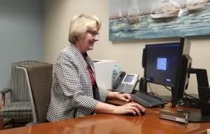 Dr. Gina Huhnke in her office at Midtown Deaconess Hospital in Evansville, Indiana. 