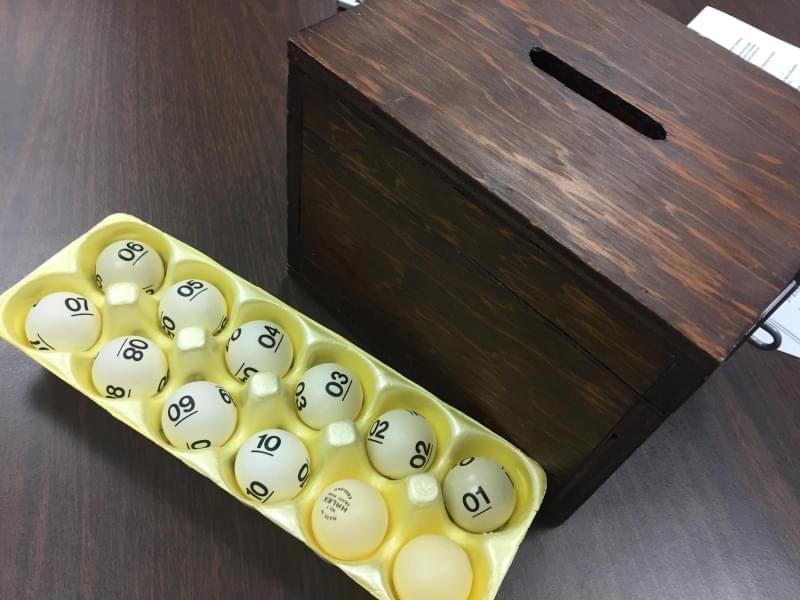 Numbered balls waiting to go into the election lottery box.