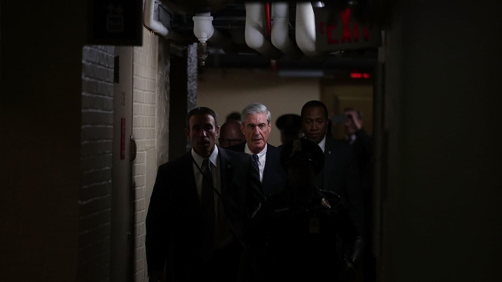Special counsel Robert Mueller (C) leaves after a closed meeting with members of the Senate Judiciary Committee on June 21, 2017, at the Capitol in Washington, D.C. 