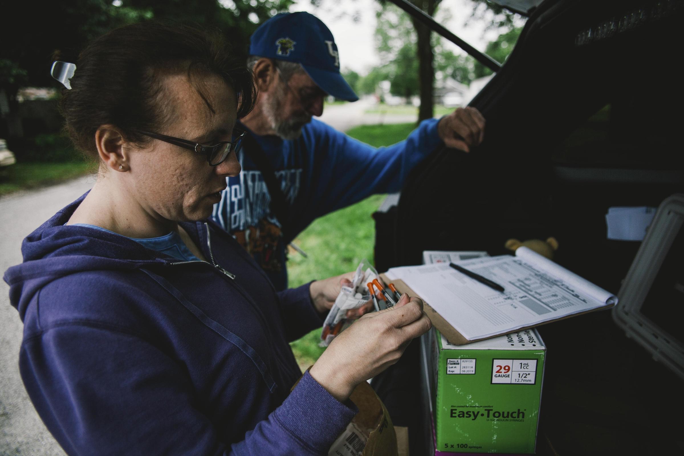 The Scott County Health Department's Brittany Combs makes a weekly stop with the county's syringe exchange program's mobile unit in Austin, Indiana.
