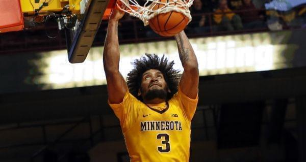 Minnesota's Jordan Murphy dunks against Illinois' in the second half of an NCAA college basketball game Wednesday, Jan. 3, 2018, in Minneapolis. 