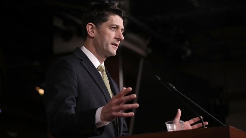 Speaker of the House Paul Ryan, R-Wis., answers questions Thursday on the possibility of a government shutdown. After receiving assurances from Ryan, a key group of conservative House Republicans said they would support a short-term-funding bill. 