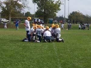The O'Fallon Little Panthers youth football team after a game in 2008.