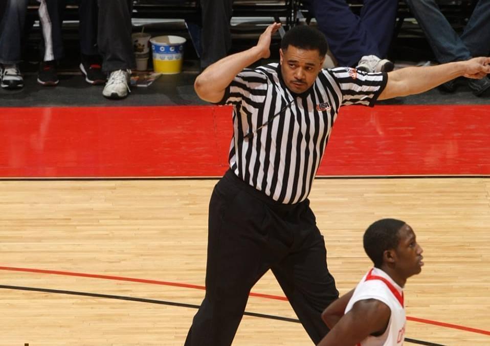 A referee at a high school basktball game
