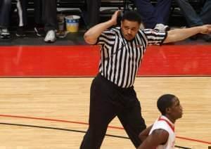 A referee at a high school basktball game