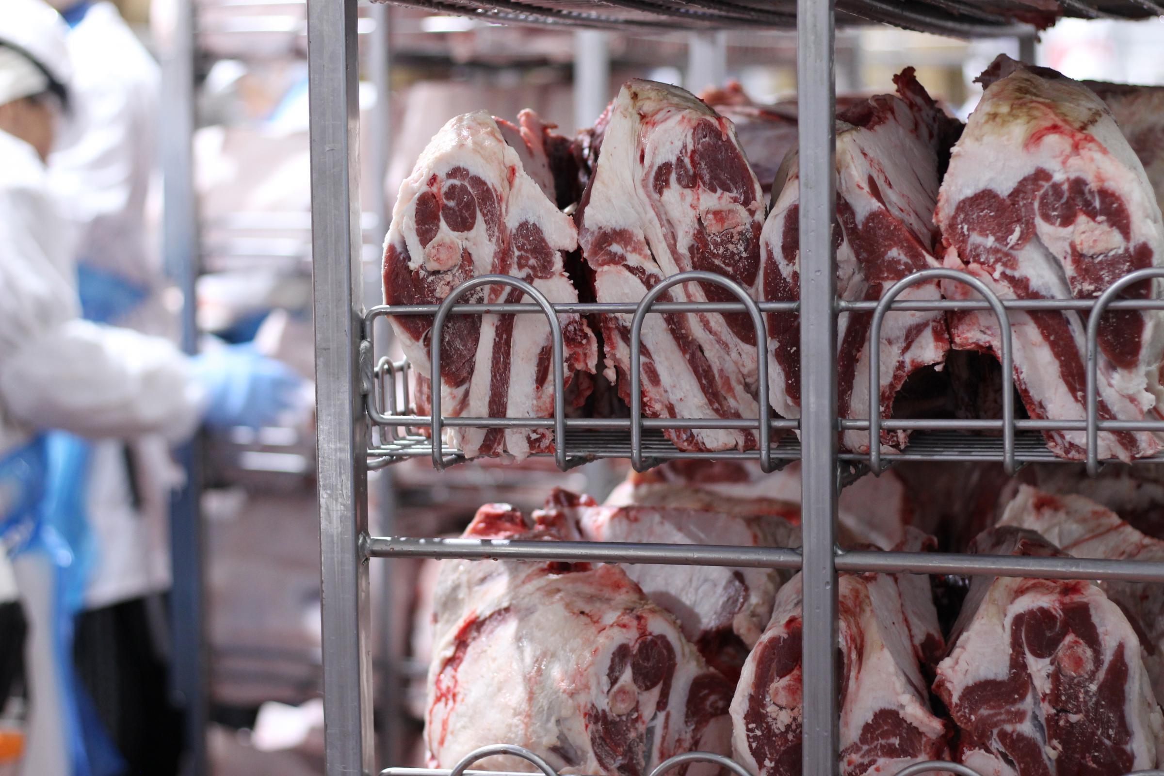 Cuts of halal lamb shoulder sit on a shelf at the Superior Farms plant in Denver, waiting to be sold to small speciality stores that cater to Muslim consumers.