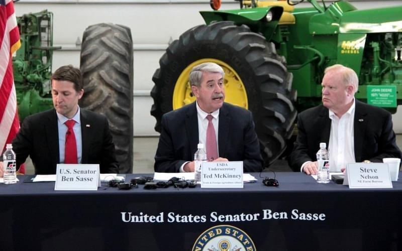The U.S. Department of Agriculture's undersecretary for trade, Ted McKinney, speaks at a roundtable discussion Wednesday in Omaha, Nebraska, with U.S. Sen. Ben Sasse (left) and Nebraska Farm Bureau President Steve Nelson.