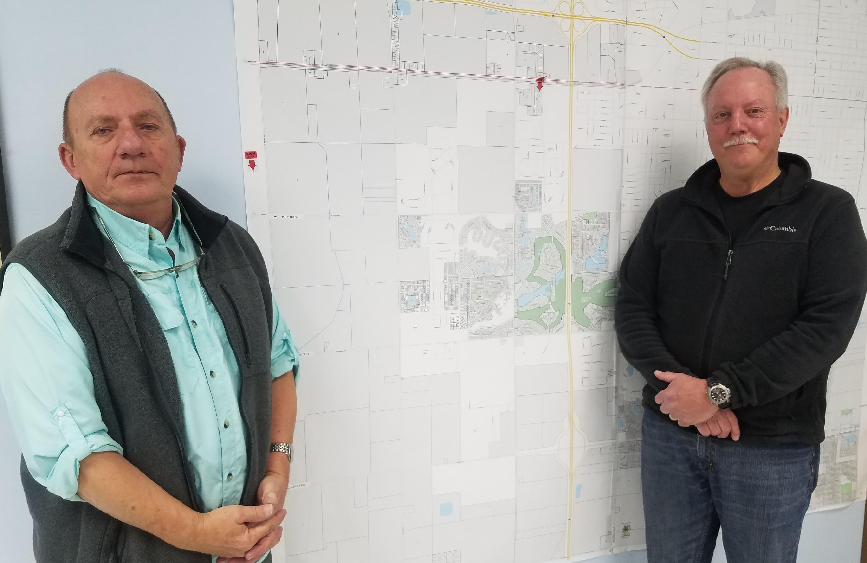 Champaign Township Supervisor Bryan Wrona and Assessor James Weisinger .