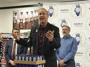 Gov. Bruce Rauner addresses the public at Binny's Beverage Depot in Springfield on March 14 at the unveiling of the official Bicentennial beer cans.