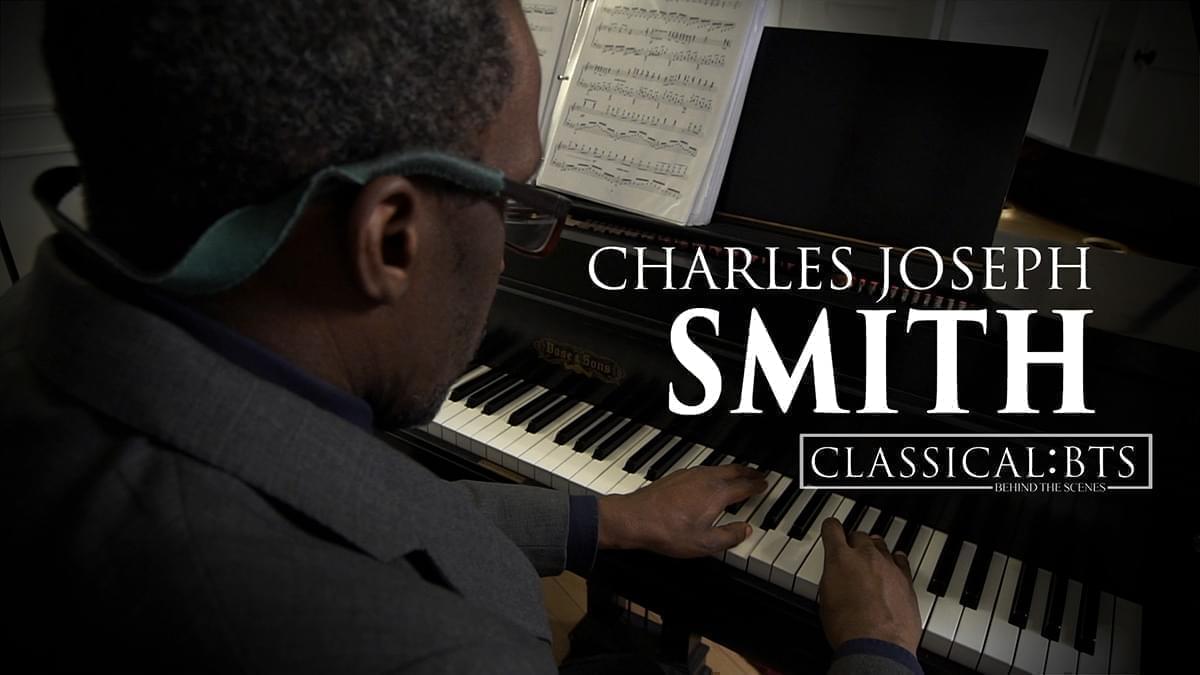 Charles Joseph Smith playing a piano