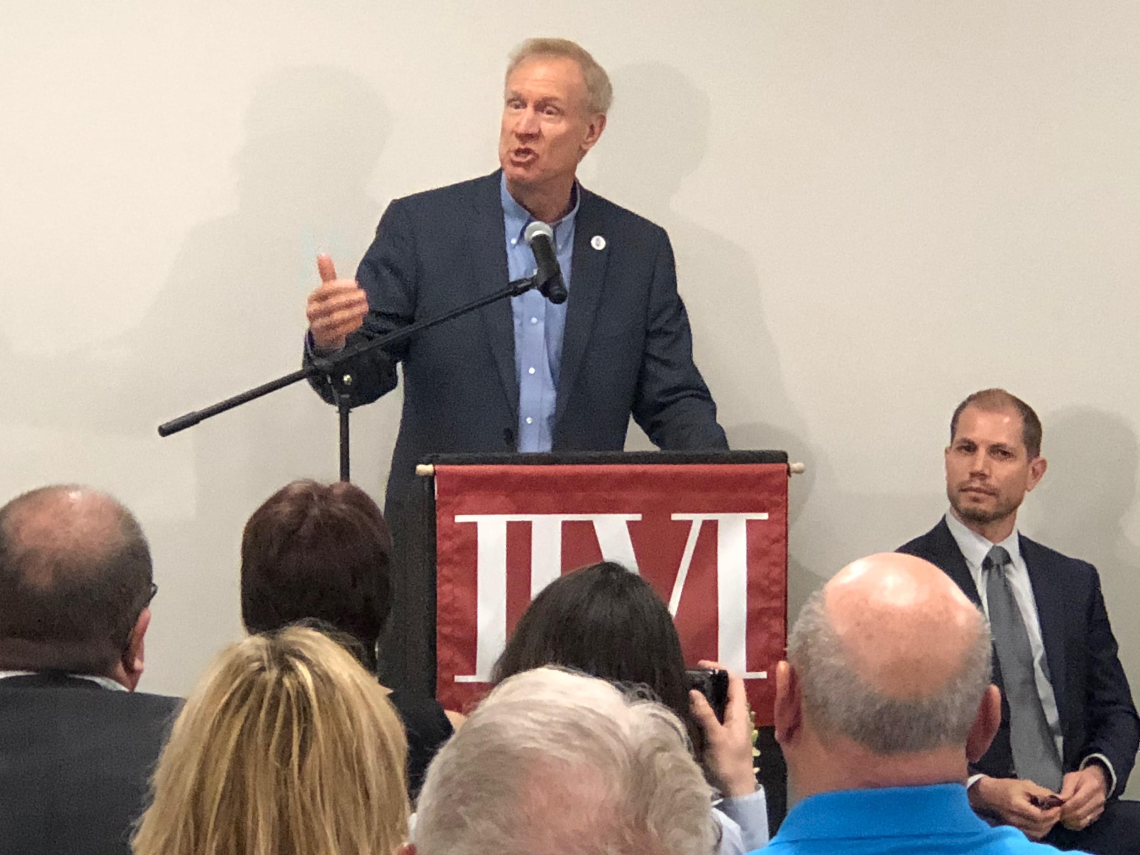 Governor Bruce Rauner at a facility for II-VI EpiWorks, a maker of semi-conductors. 