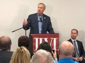 Governor Bruce Rauner at a facility for II-VI EpiWorks, a maker of semi-conductors. 