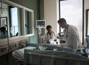 Health care workers in a hospital room