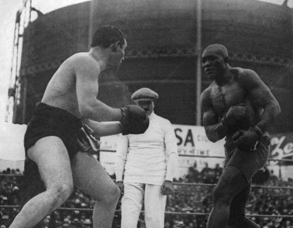 Tommy Burns and Jack Johnson fighting for the heavyweight title in 1908.
