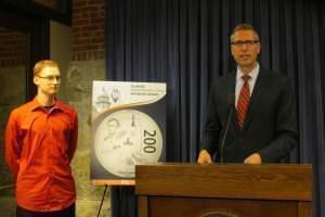 Illinois Treasurer Mike Frerichs announces the winning coin design