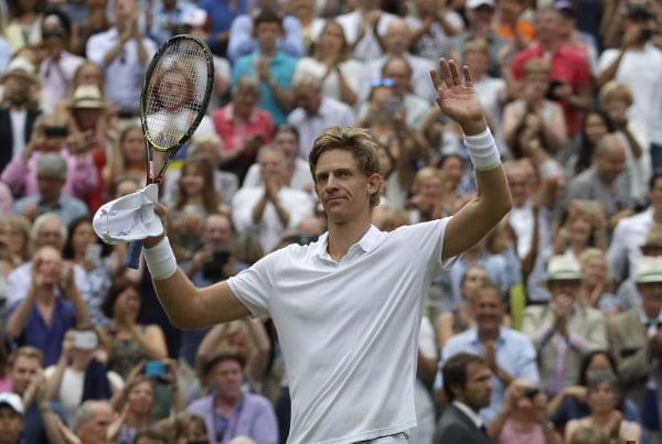 South Africa's Kevin Anderson celebrates defeating John Isner of the United States in their men's singles semifinals match at the Wimbledon Tennis Championships, in London, Friday July 13, 2018.