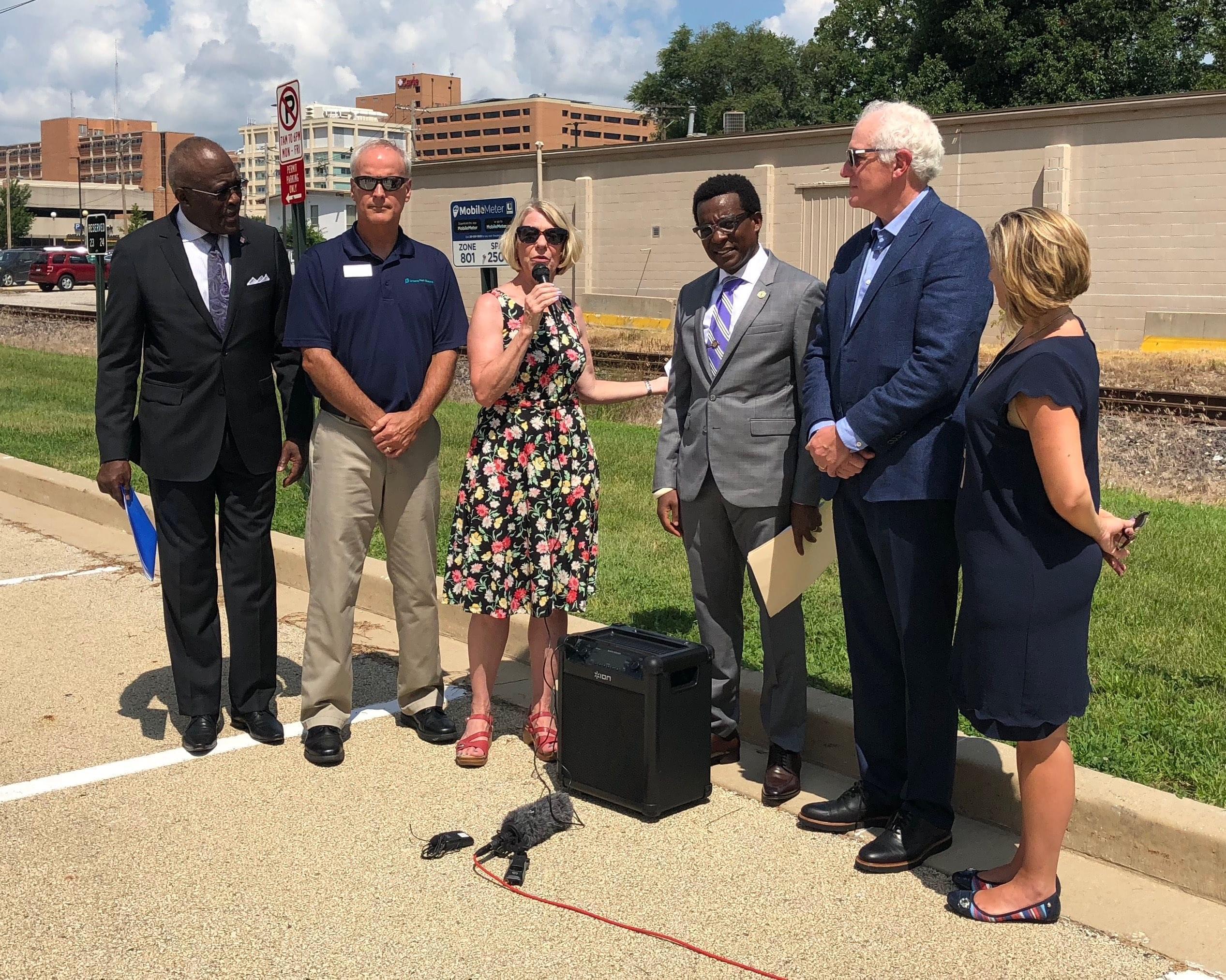 Urbana Mayor Diane Marlin and U Of I Chancellor Robert Jones were among local stakeholders who announced $125,000 in federal funding to study how the Kickapoo Rail Trail could be extended west through downtown Urbana.