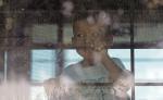 A child looking out a window