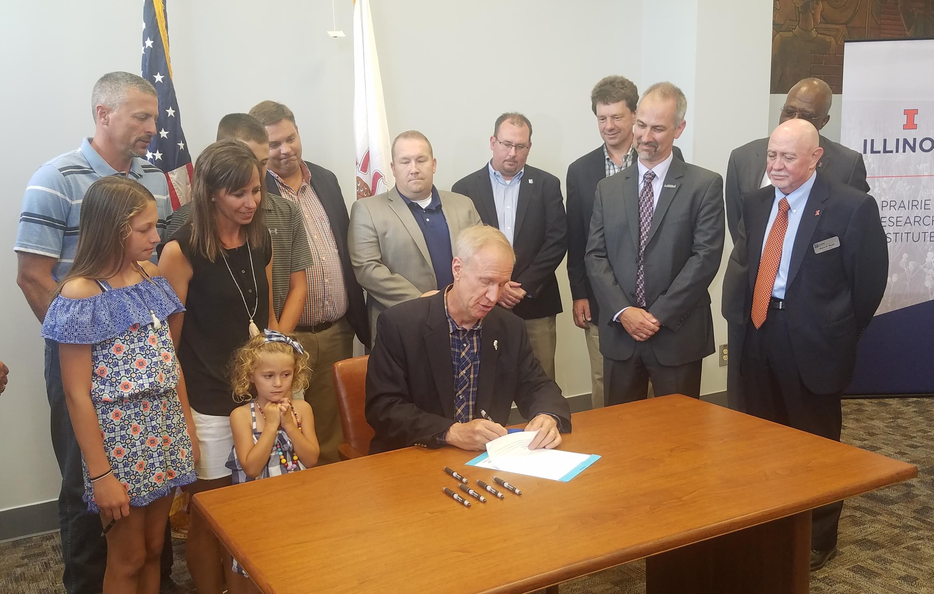 Gov. Bruce Rauner signs bill adding safety measures to People's Gas Manlove Gas Storage Field in Champaign County.