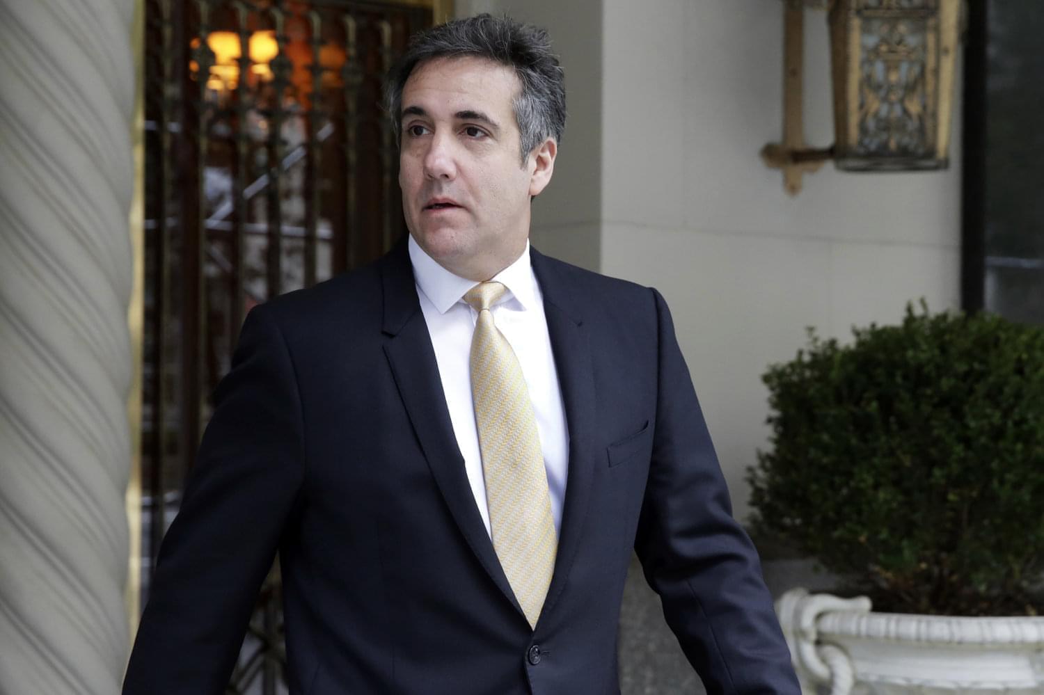 

Michael Cohen, former personal lawyer to President Trump, leaves his apartment building in New York City on Tuesday. 