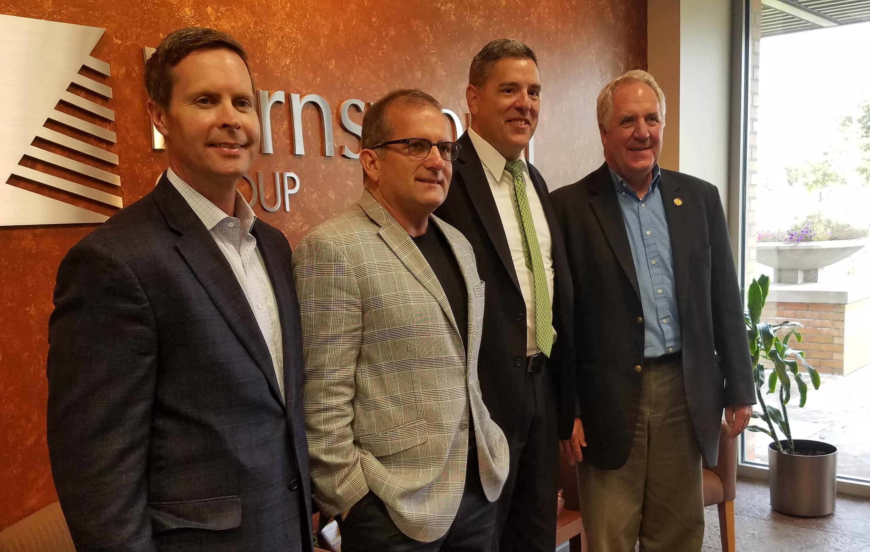 Congressmen Rodney Davis and John Shimkus pose with Farnsworth Group executives Greg Cook & Matt Davidson.