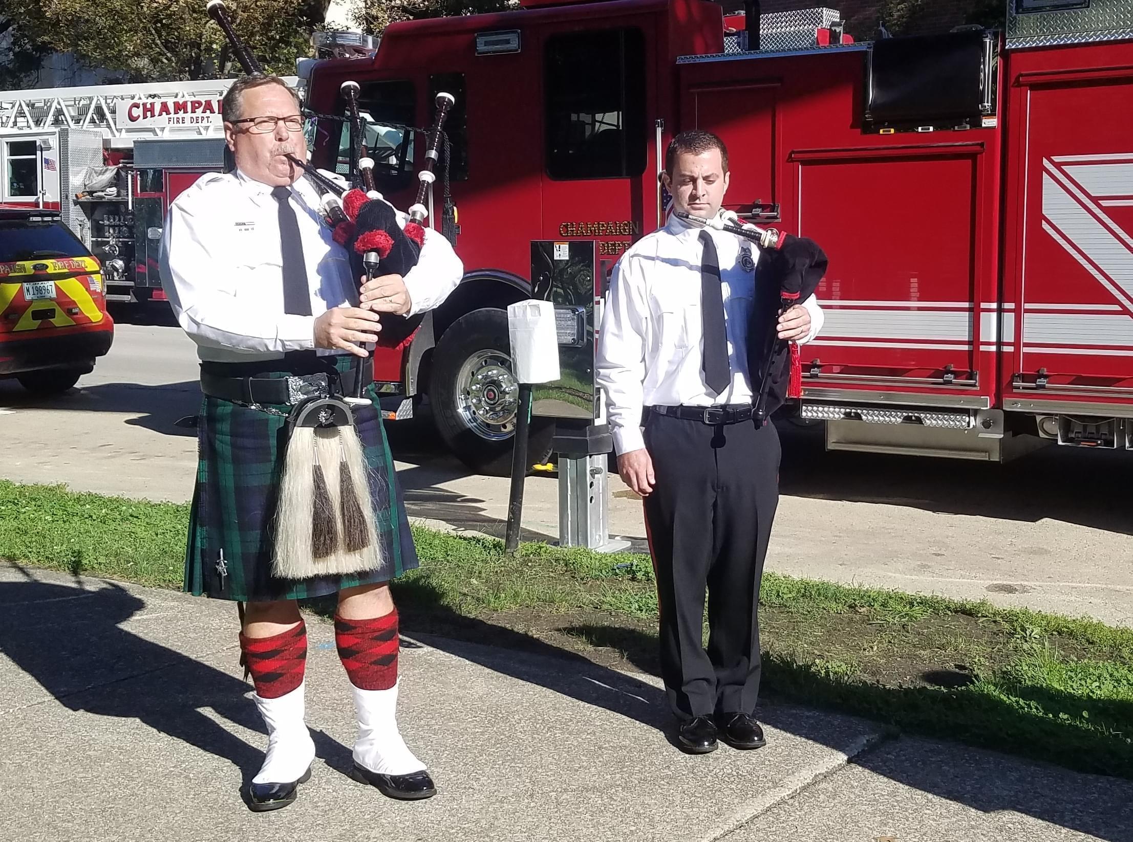 Champaign Fire Department bagpipers, Capt. Todd Hitt and Firefighter Zach Tish.