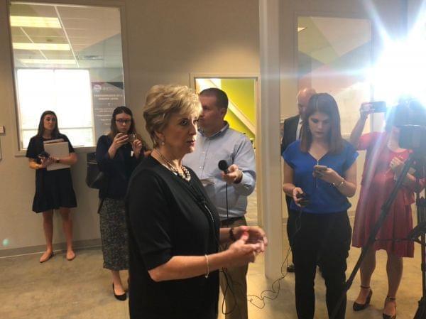 SBA Administrator Linda McMahon speaks with reporters after a tour of startup companies housed at EnterpriseWorks at the University of Illinois Research Park. 