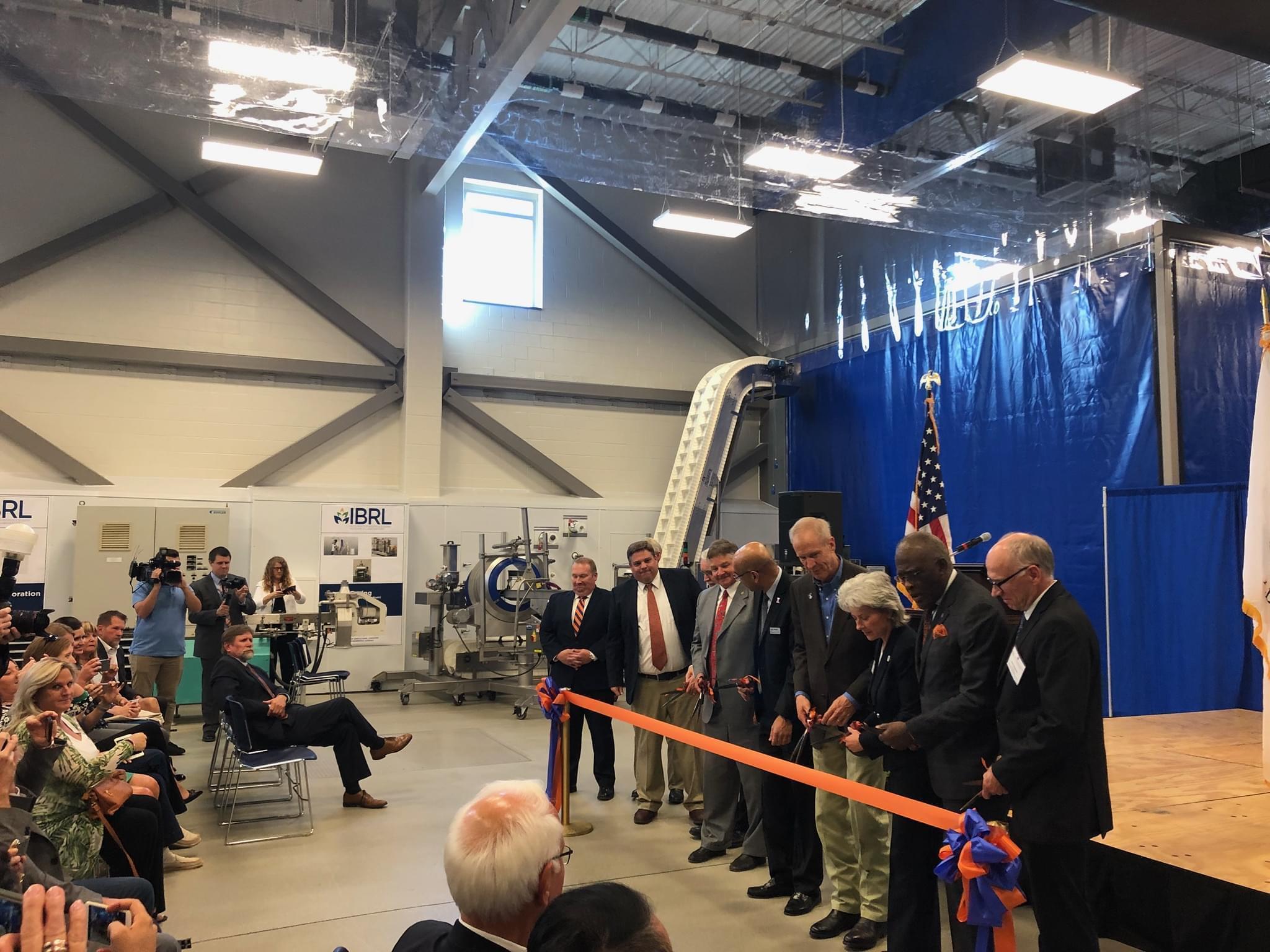 University of Illinois administrators, local legislators and  the governor during a ribbon cutting at the IBRL facility on the U of I Urbana campus. 