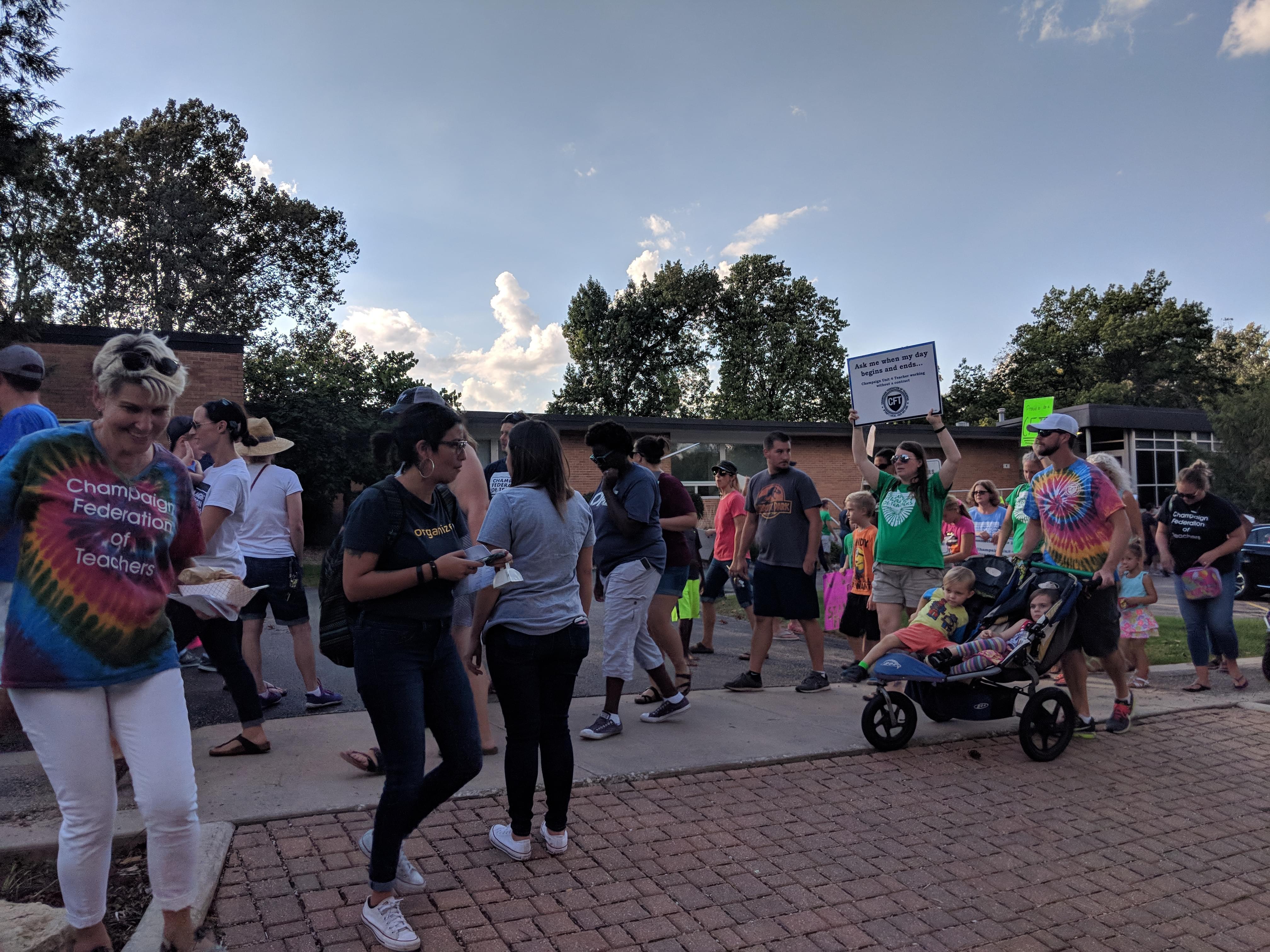 Roughly 200 teachers, as well as children and union supporters rallied outside the Champaign Unit 4 administration building on Monday, Oct. 8, 2018.