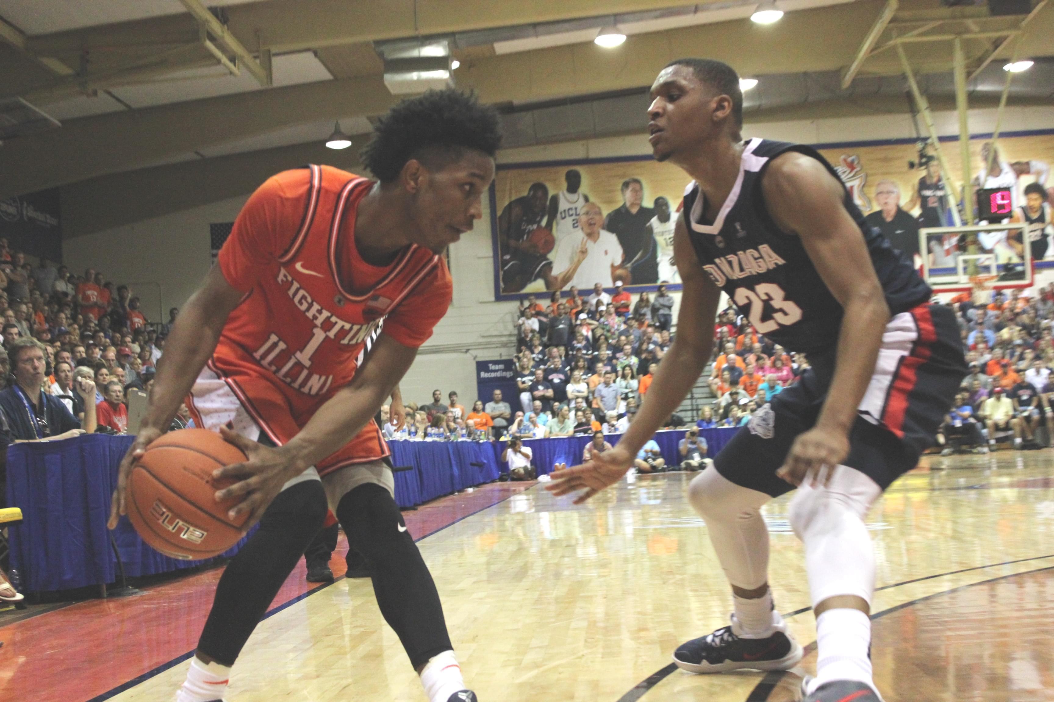 Trent Frazier looks for an opening as Gonzaga's Zach Norvell closes in, Monday night at the Maui Invitational in Lahaina, Hawaii