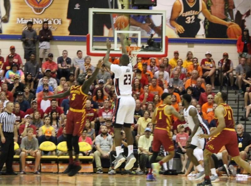 Illini basketball player Aaron Jordan scoring a three-pointer against Iowa State at the Maui Invitational. 