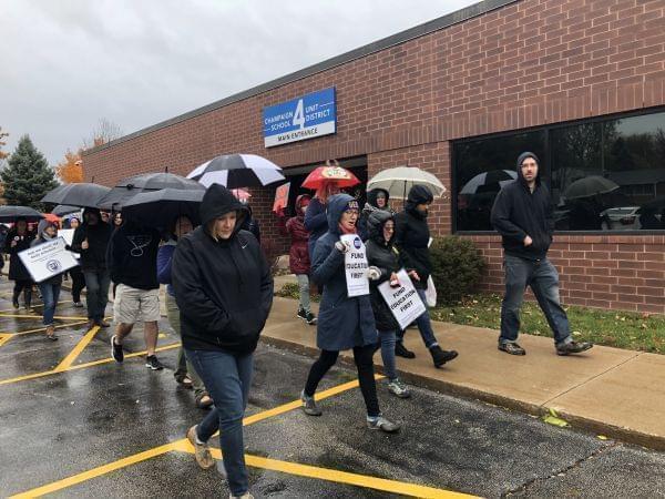 Teachers from Champaign's Unit 4 school district picket outside of the district's administrative offices, Thursday, Nov. 1, 2018. 