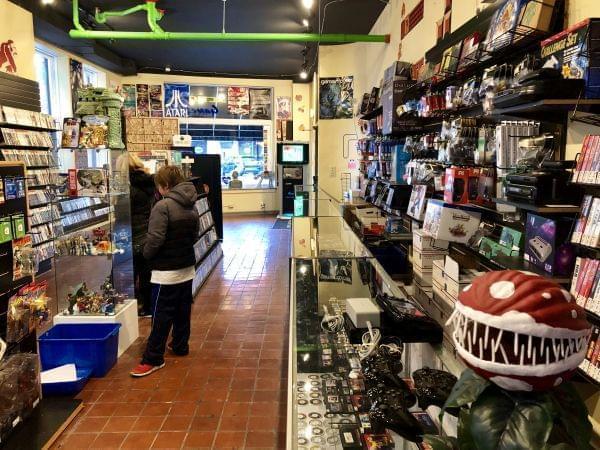 Live Action Games, a video game store on University Avenue, is one of several local shops participating in Small Business Saturday Nov. 24 in downtown Champaign. 