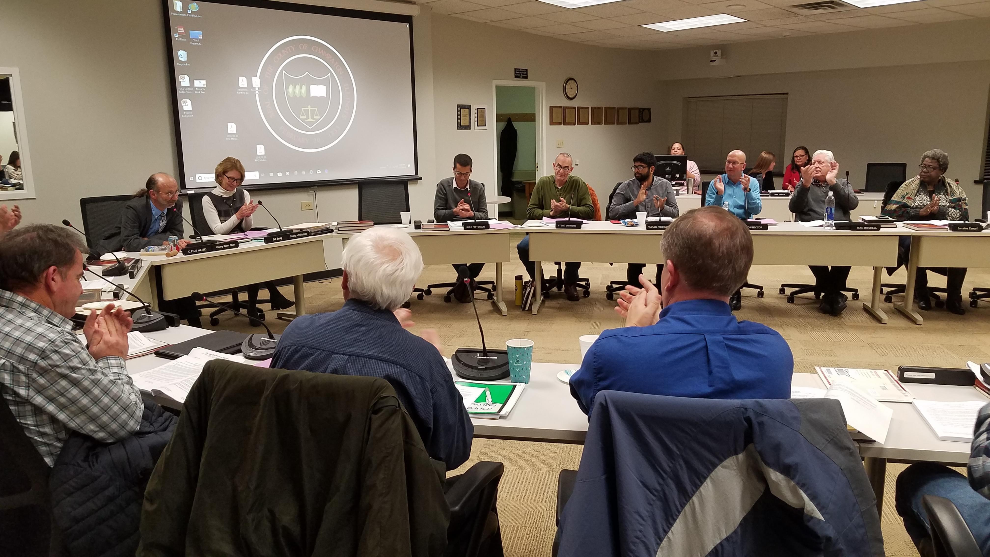 The Champaign County Board, in its final meeting of the 2017-18 term.