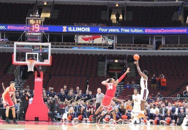 Kipper Nichols connects on a three-point attempt in front of a largely empty United Center, Wednesday December 5 in Chicago.