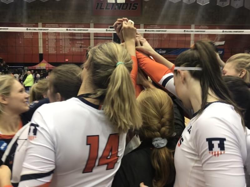 Emily Hollowell and her Illini teammates in the postgame huddle after a 3-1 win over Wisconsin on Saturday December 8 at Huff Hall in Champaign.