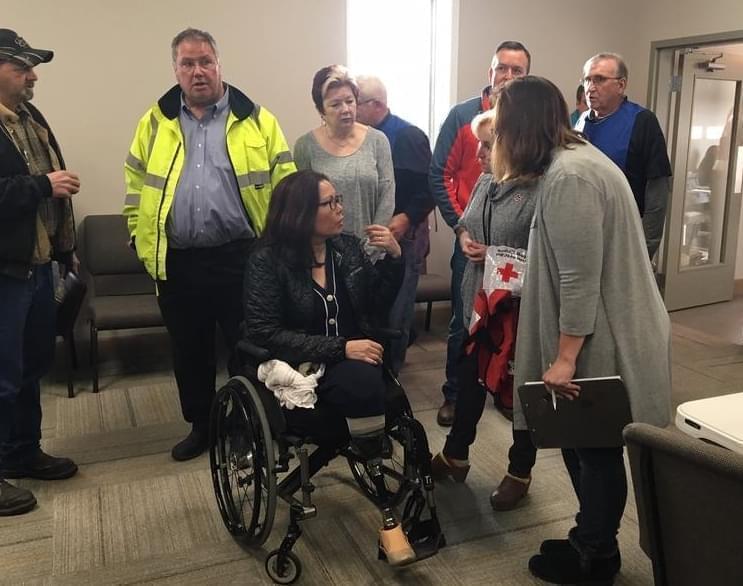 U.S. Sen. Tammy Duckworth meets with first responders Friday during a visit to Taylorville.